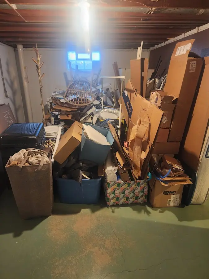 Roll-off dumpster container at job site for 4 Yard Dumpster Rental in Saugatuck